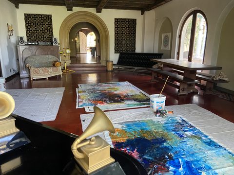 Canvases in progress on the floor of Daniel Lanois's home